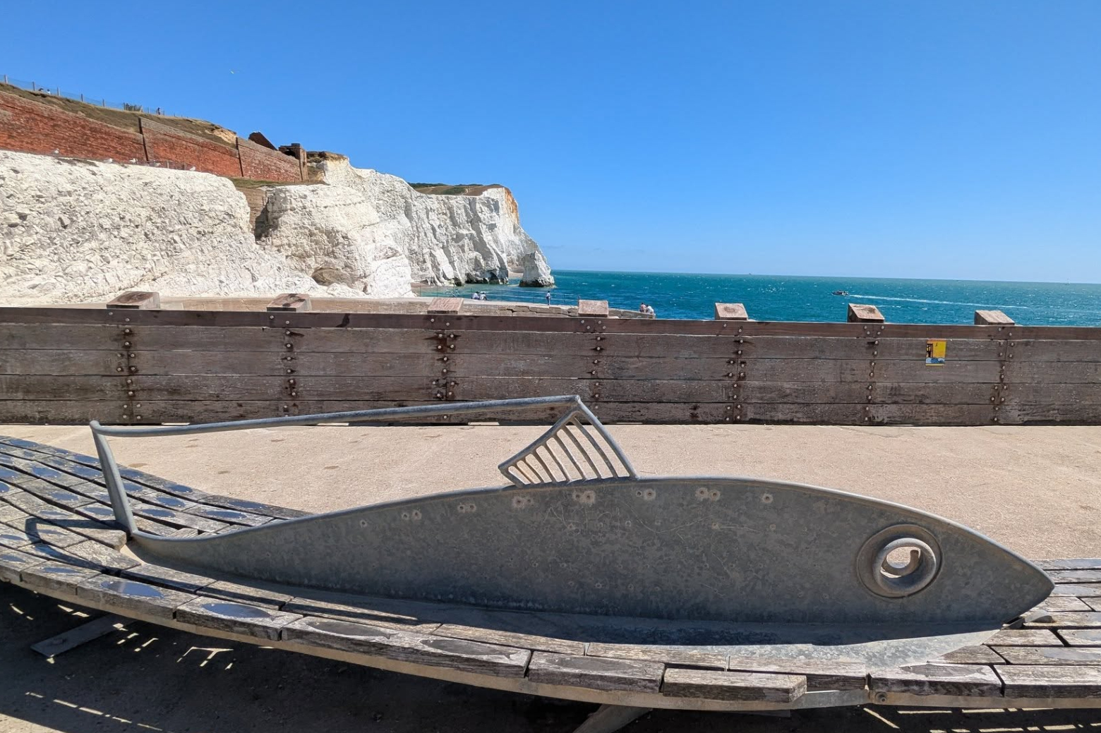 The Shoal community seat with Seaford Head in backdrop