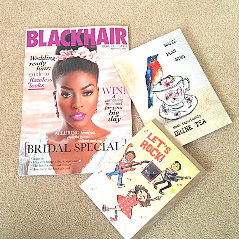 Nyha Graphics stationery and one Black Hair magazine in flat lay