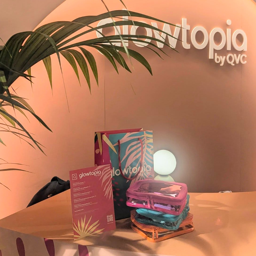 glowtopia reception desk with indoor plant