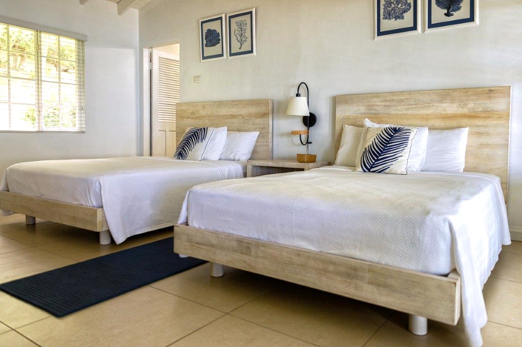 image of Blue Waters Inn EXECUTIVE-ROOMS-4-6-OR-8 light bright with seaside theme decor